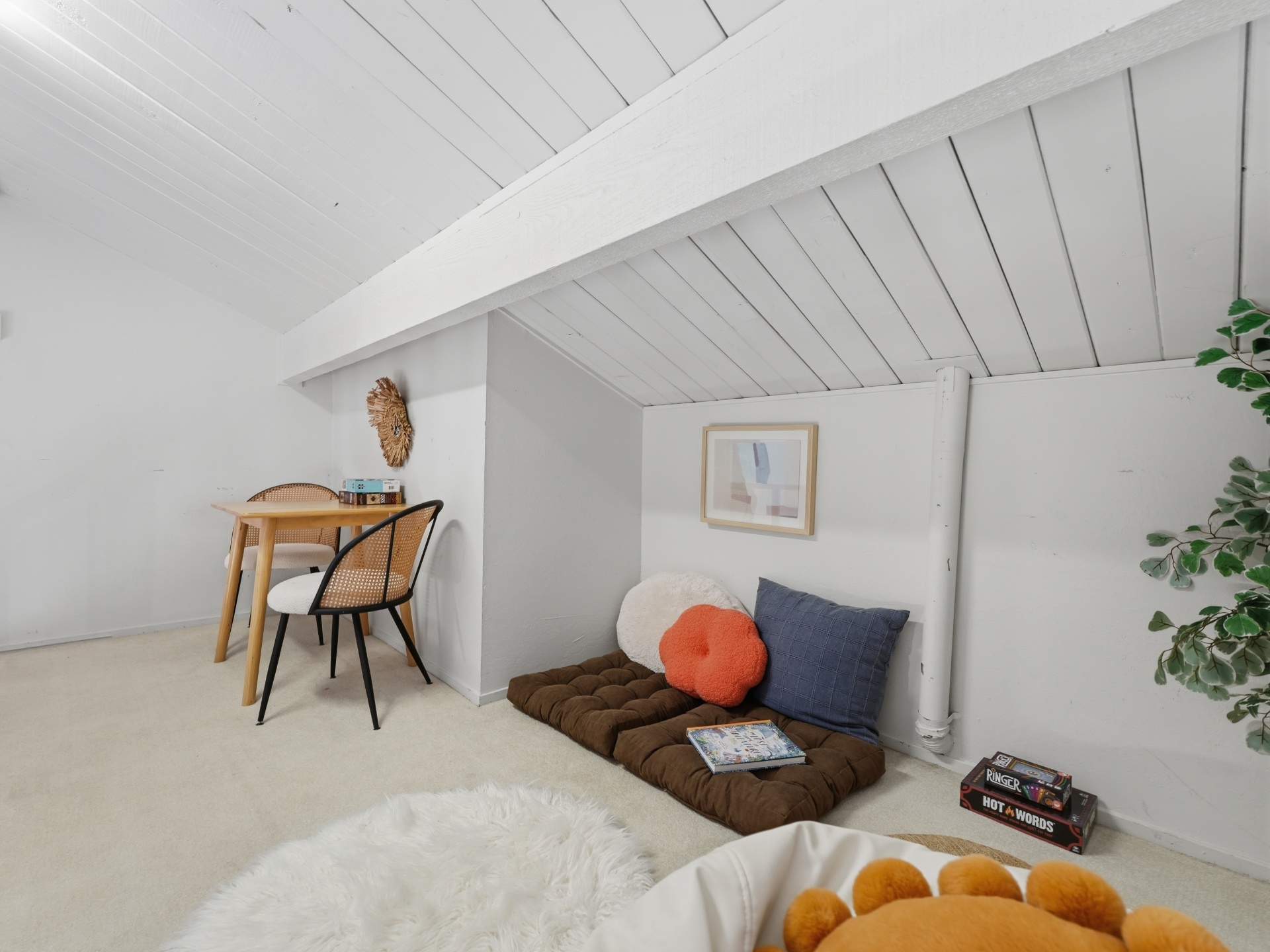Loft bonus space with reading cushions, games and play area